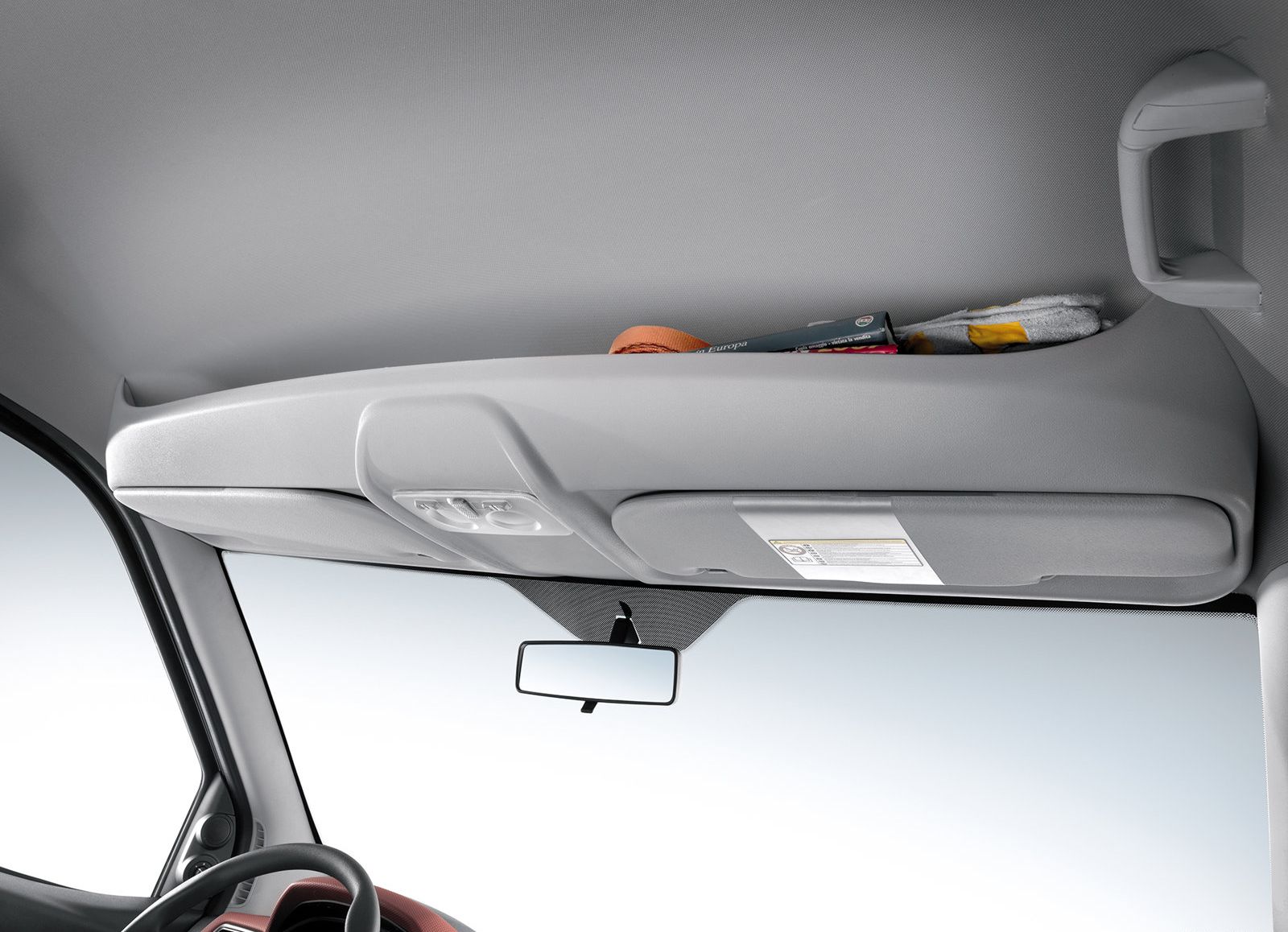 FIAT Doblo - interior, shelf above the driver and front passenger, photo 1